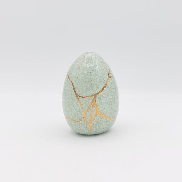 Decorative Gold-Accented Ceramic Egg