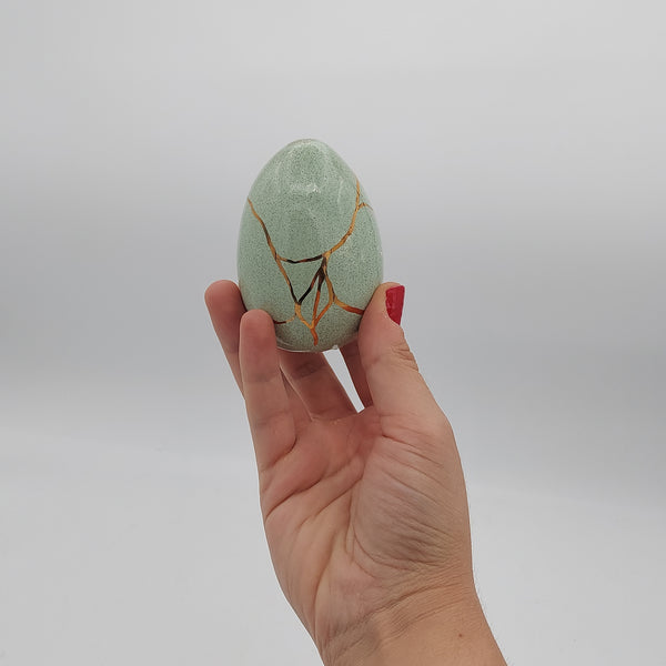 Decorative Gold-Accented Ceramic Egg