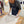 Person working on a wooden surface with tools and materials