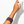 A close-up of a person's arm and hand wearing a wide black cuff bracelet with colorful embroidered swirl patterns in red, green, blue, and purple, set against a plain white background with a soft shadow.