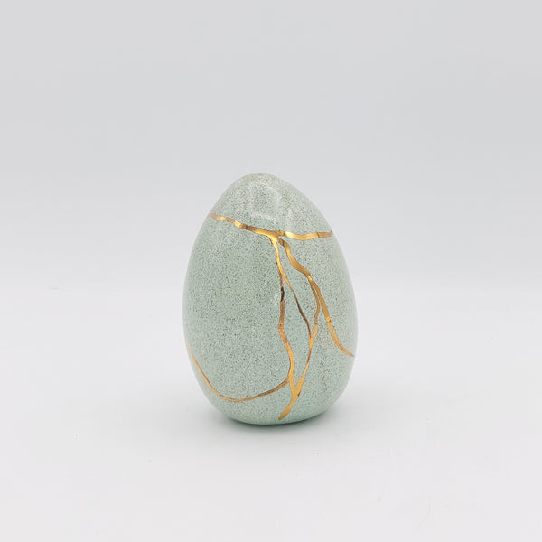 Decorative Gold-Accented Ceramic Egg